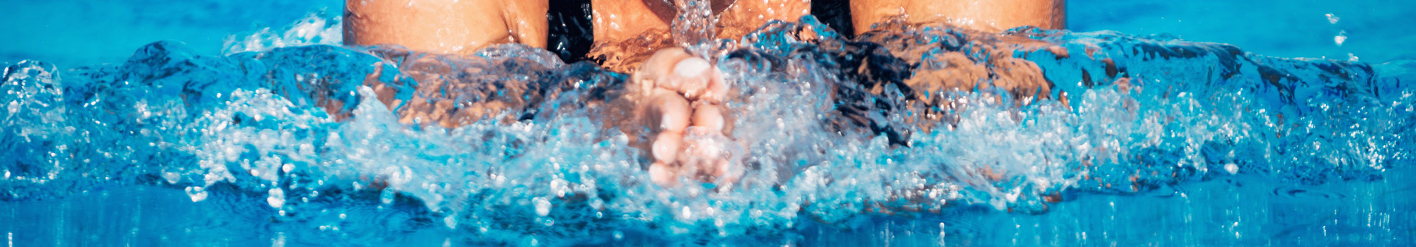 Woman Swimming Breast Stroke